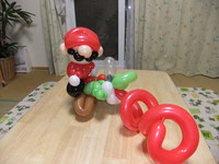 赤いおじさんと緑の恐竜 2009/09/23 11:34:14